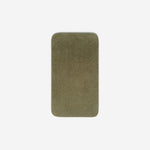 Top view of a dar olive organic cotton face towel laid flat with rounded corners, shown on a white background.